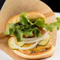 Cheeseburger · Pat Lafrieda Brisket Blend smashed burger served with American cheese, green leaf lettuce, t...