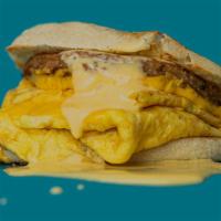 Sausage, Egg & Cheese Sandwich · Ground pork breakfast sausage, scrambled eggs, and American cheese served on a toasted Engli...