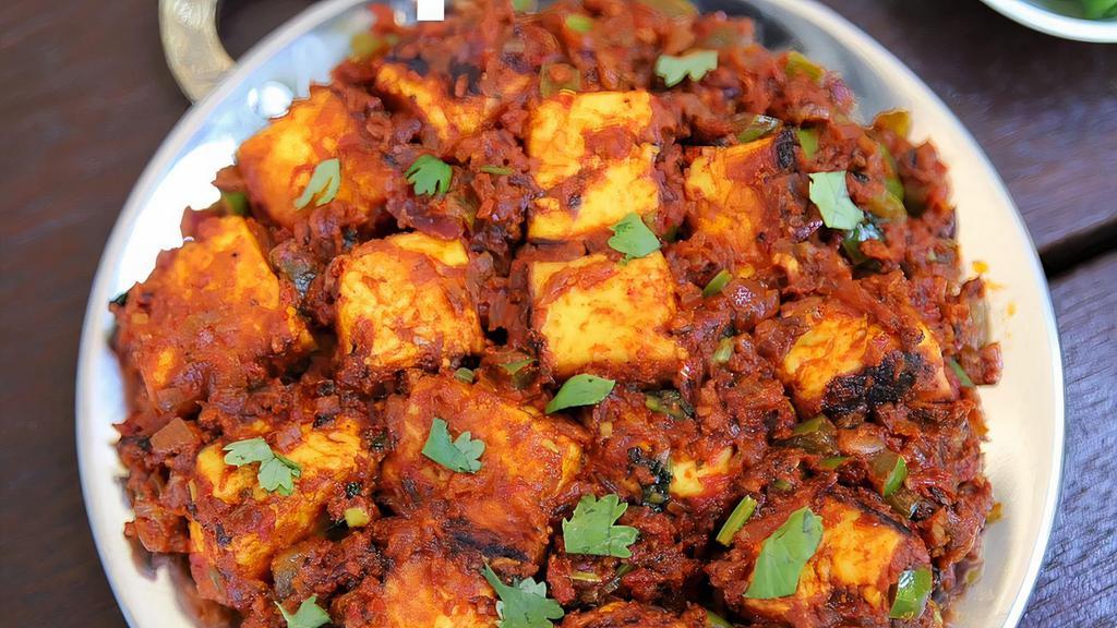 Paneer Chilli · A Fried Paneer Recipe Prepared In Onion, green Bell pepper By Adding Green Chilies.