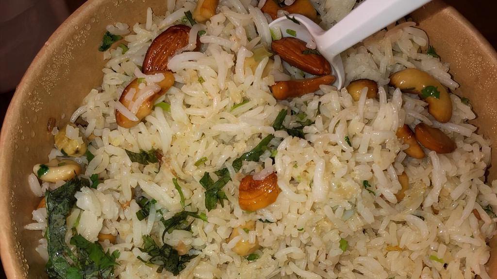 Vegetable Biryani  · Basmati Rice Cooked With Mixed Vegetables.
