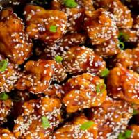 Sesame Chicken · Chicken tossed rapidly over a high flame in our chef's special sauce with sesame seed.