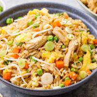 Chicken Fried Rice · Stir-fried rice with poultry.