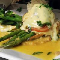 Chicken Pasquale · Breast of chicken sautéed with garlic, mushrooms, roasted peppers, asparagus in white wine t...