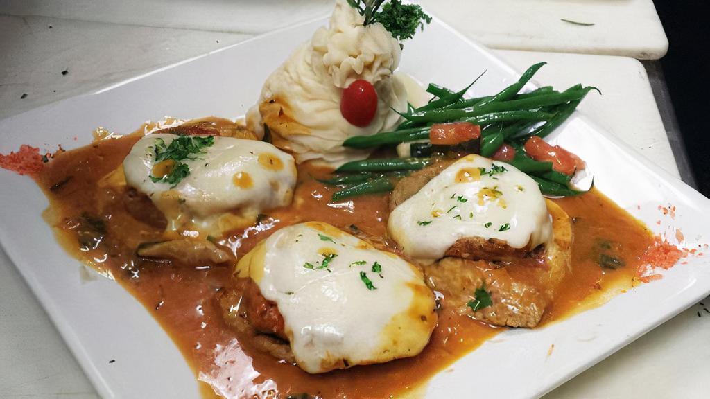 Chicken Sorrentino · Chicken tossed with eggplant, prosciutto and mozzarella cheese with special light red sauce.