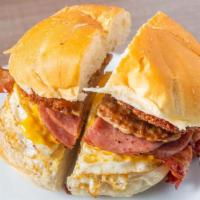 Hungryman Breakfast · Pork Roll, Bacon, Sausage, Eggs, Cheese & Hash Browns