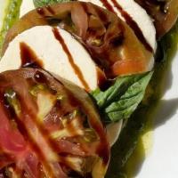 Caprese Salad · house-made mozzarella /pesto / balsamic/ heirloom tomato