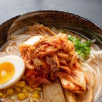 Kome Miso Kimchi Ramen · Kome miso, pork and chicken-based soup. Topped with kimchi, ground pork, bean sprouts, scall...