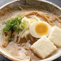 Shiro Miso Ramen · Shiro miso, pork and chicken-based soup. Topped with ground pork, bean sprouts, scallion, fr...