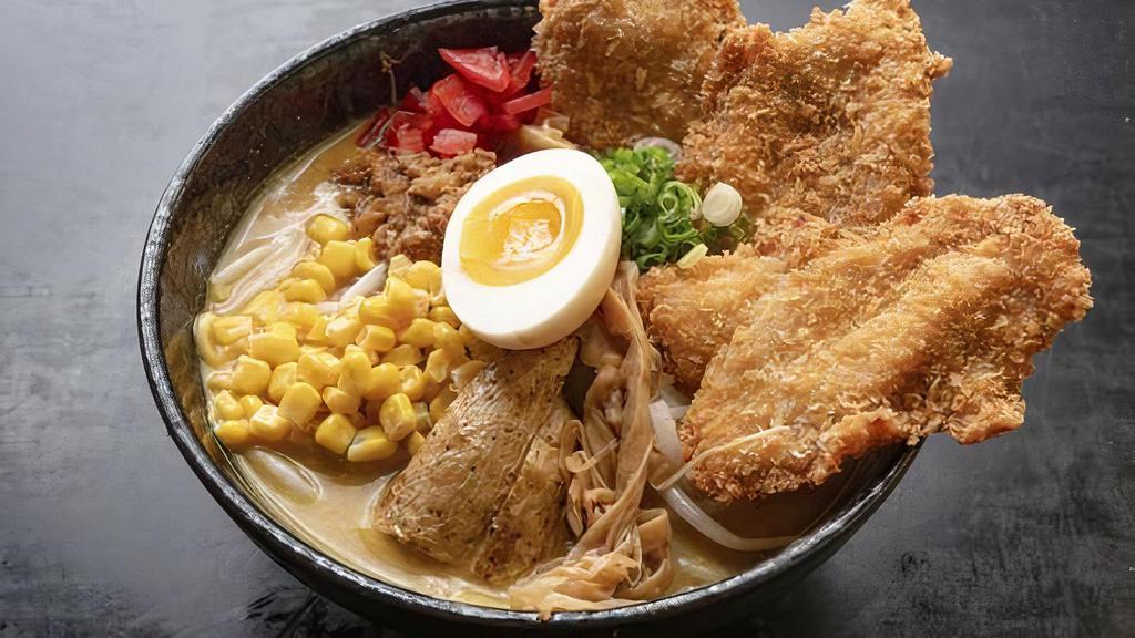 Miso Curry Chicken Katsu Ramen Special · Rich curry-flavored miso soup base. Topped with 3 pieces crispy chicken cutlet, ground pork, bean sprouts, scallion, corn, menma as bamboo shoot, fukujinzuke as pickled daikon radish, and miso egg.