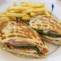 Chicken Cordon Bleu Panini · Grilled Chicken, Grilled Ham, Swiss Cheese, and Mixed Greens. Served with French fries or so...