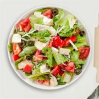 In The House Salad · Romaine lettuce, mixed baby greens, vine tomatoes, bermuda onions, cucumbers, black olives, ...