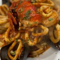 Amici'S Seafood Special · Clams, lobster, shrimps, mussels, scallops, and calamari in marinara sauce served with pasta...