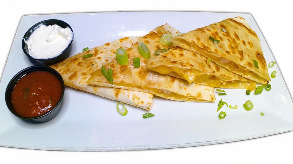 Quesadillas · SERVED WITH SOUR CREAM AND SALSA