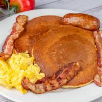 The Lumberjack · choice of pancakes or french toast, two eggs, any style, with two strips of bacon and two sa...