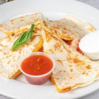 3 Cheese Quesadillas · Served with sour cream.