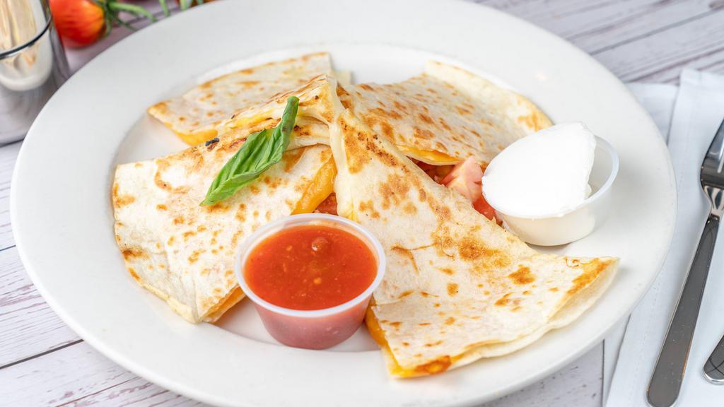 3 Cheese Quesadillas · Served with sour cream.