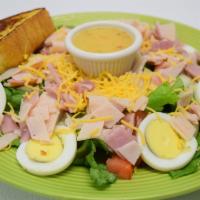 Chef Salad · Ham, turkey, tomatoes, onions, green peppers, diced hard boiled eggs, croutons, and cheddar ...