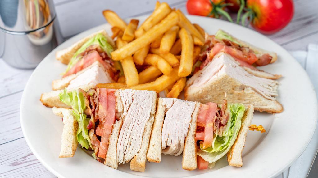 Turkey · All white meat turkey with bacon, lettuce and tomato.