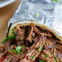 Steak (Burrito) · Served with Mexican rice, sour cream, beans, letters, and tomatoes.