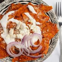 Just Chilaquiles · Served with sour cream and parmesan cheese.