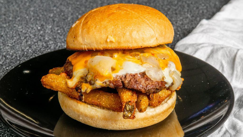 Boom Boom Burger · 1⁄4 pound cheeseburger with grilled onions, fried pickles and spicy boom boom sauce.