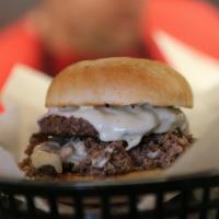 Philly Burger · 1⁄4 pound cheeseburger topped with cheese and steak.