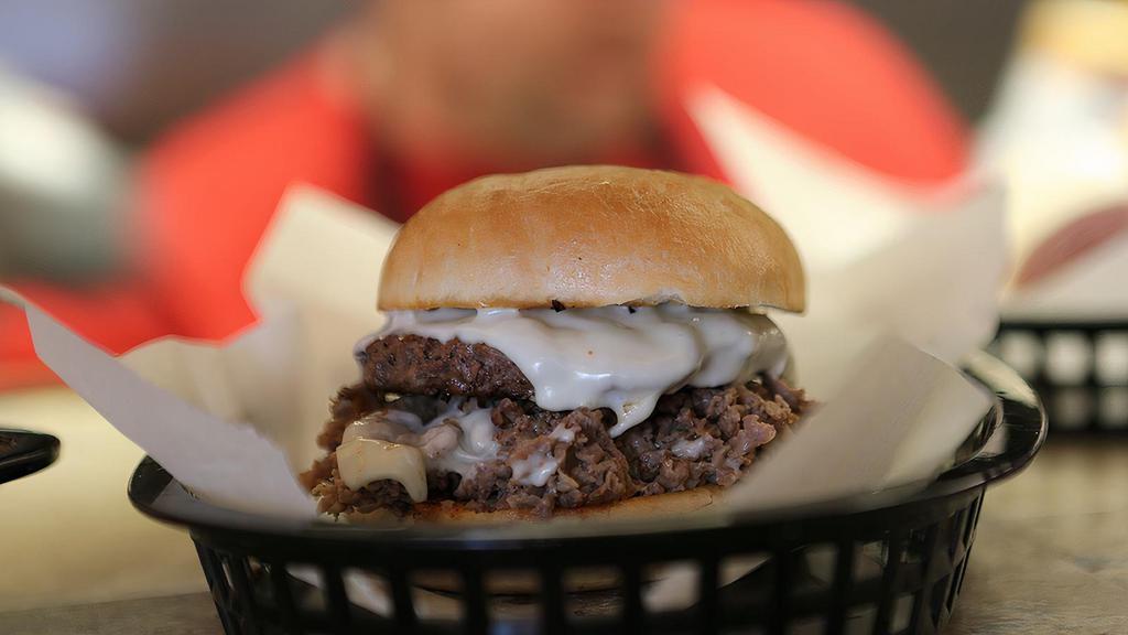Philly Burger · 1⁄4 pound cheeseburger topped with cheese and steak.