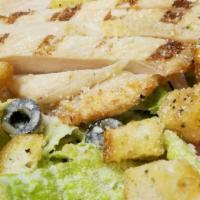 Caesar · Romaine lettuce, onions, tomatoes, cucumbers, black olives, croutons, and Parmesan cheese to...