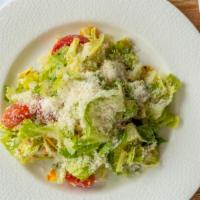 Caesar Salad · Garlic bread crumbs, heirloom tomatoes parmesan.