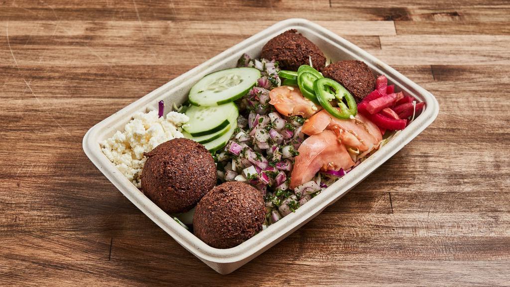 Salad Bowl · Crispy, crunchy, market fresh salad with choice of protein, toppings and sauces.