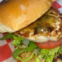 Grilled Chicken Sandwich · Our select grilled chicken sandwich, matched with a hint of lettuce, tomato and our homemade...