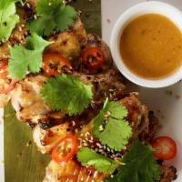 Grilled Lemongrass Wings (Gf) · with sambal sauce, sesame seeds,. chilies and cilantro.