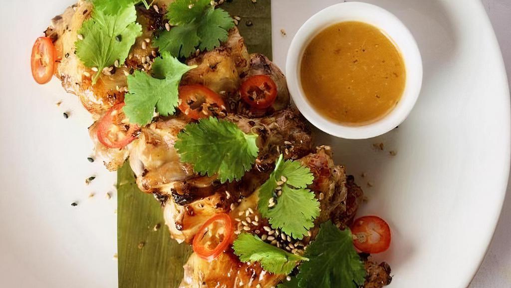 Grilled Lemongrass Wings (Gf) · with sambal sauce, sesame seeds,. chilies and cilantro.
