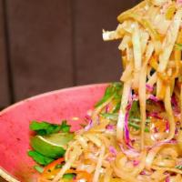 Peanut Street Noodles (Gf, V) · Stir fried in peanut sauce, sugar snap peas, red cabbage, bean sprouts, red chilies, scallio...