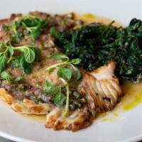 Sauted Skate · Pan seared skate, citrus beurre blanc, capers, sautéed spinach.