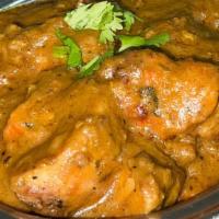 Tikka Masala  · Chicken mixed with spicy masala cooked over charcoal.