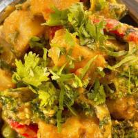 Mixed Vegetable Curry · Seasonal vegetables cooked in a sweet red curry sauce.