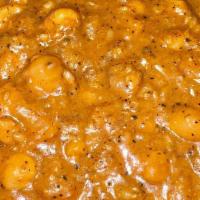 Chana Masala · Stewed chickpeas with creamed spices.