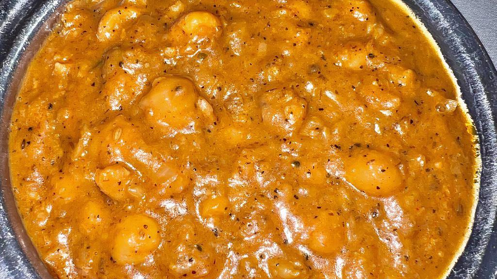 Chana Masala · Stewed chickpeas with creamed spices.