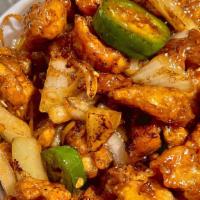 Haka Chili Chicken · Chicken tossed in a classic chili soy sauce, served in a mildly dry gravy.