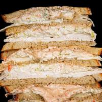 Turkey Sloppy Joe · Home Roast Turkey • Swiss Cheese • Cole Slaw • Russian Dressing • Triple Decker Rye
