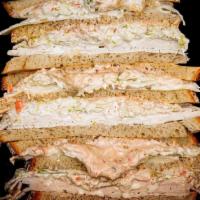 Smoked Turkey Sloppy Joe · Smoked Turkey • Swiss Cheese • Cole Slaw • Russian Dressing • Triple Decker Rye