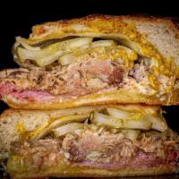 Cubano · Baked Ham • Mojo Pulled Pork • Swiss Cheese • Dill Pickle • Mustard • Garlic Mayo • Sub Roll...