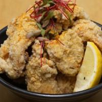 Chicken Kara-Age · Japanese batter fried chicken with yuzu cream sauce.