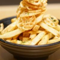 French Fries · Crispy french fries served with truffles and Parmesan garlic mayo.