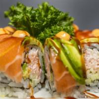 Ocean Roll · Shredded crab meat, cucumber, avocado, inside avocado, salmon on the top with spicy mayo and...