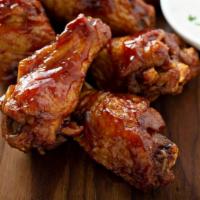 Bbq Chicken Wings · 5 pcs of BBQ Chicken wings, served with house barbecue sauce, pickled carrots and celery.