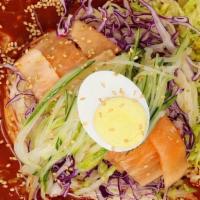 Bibim Guksu(비빔국수) · Noodle mixed with vegetables and sweet and spicy sauce.