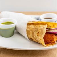 Chicken Tikka Kati Roll · Chicken thigh, marinated with yogurt and spices, and grilled .