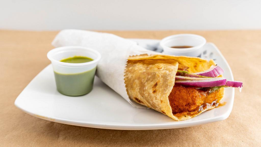 Chicken Tikka Kati Roll · Chicken thigh, marinated with yogurt and spices, and grilled .